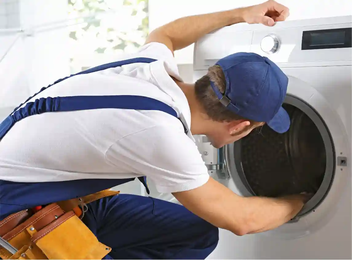 Swift Appliance Solution technician repairing a dryer in Toronto