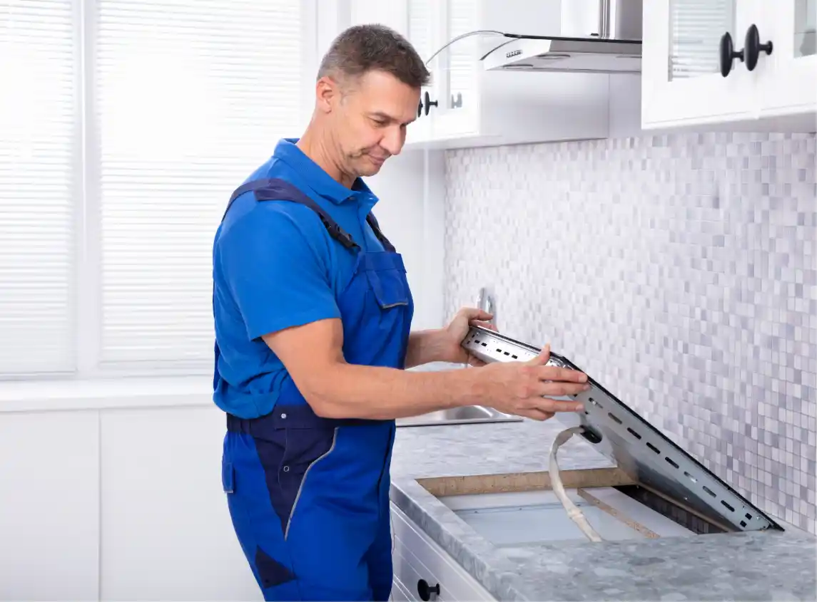 Swift Appliance Solution technician repairing a stove and cooktop in Toronto