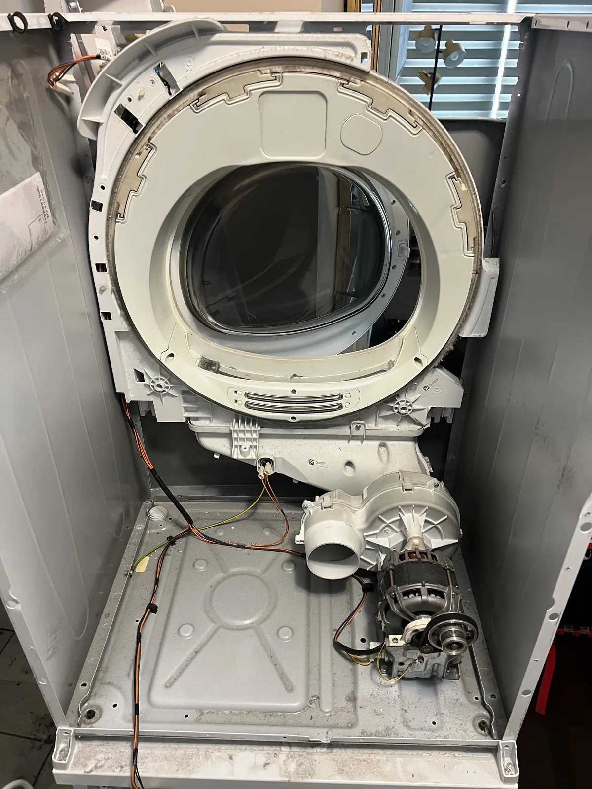 Dryer opened for teardown during a same-day repair