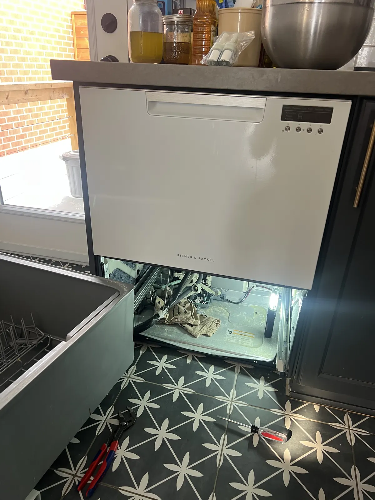 Fisher & Paykel DishDrawer dishwasher teardown during a repair in a GTA kitchen