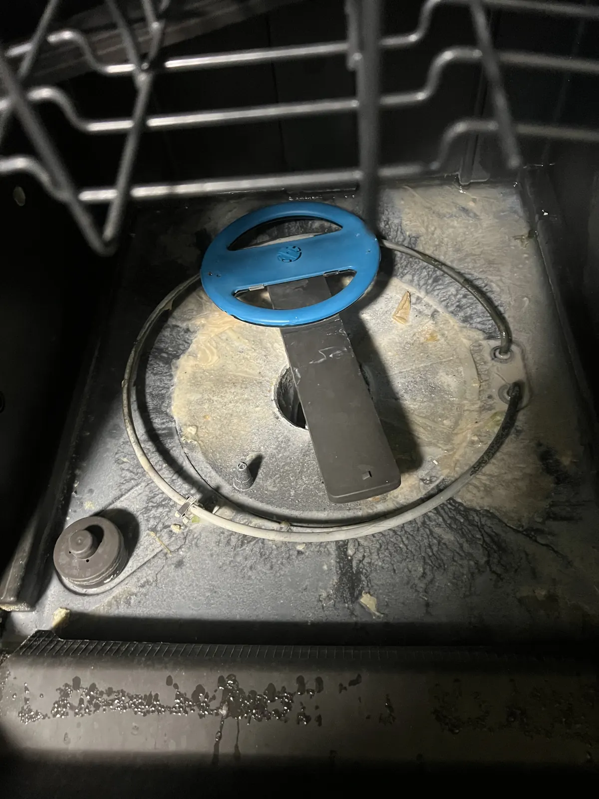 Cleaning a clogged dishwasher filter and sump