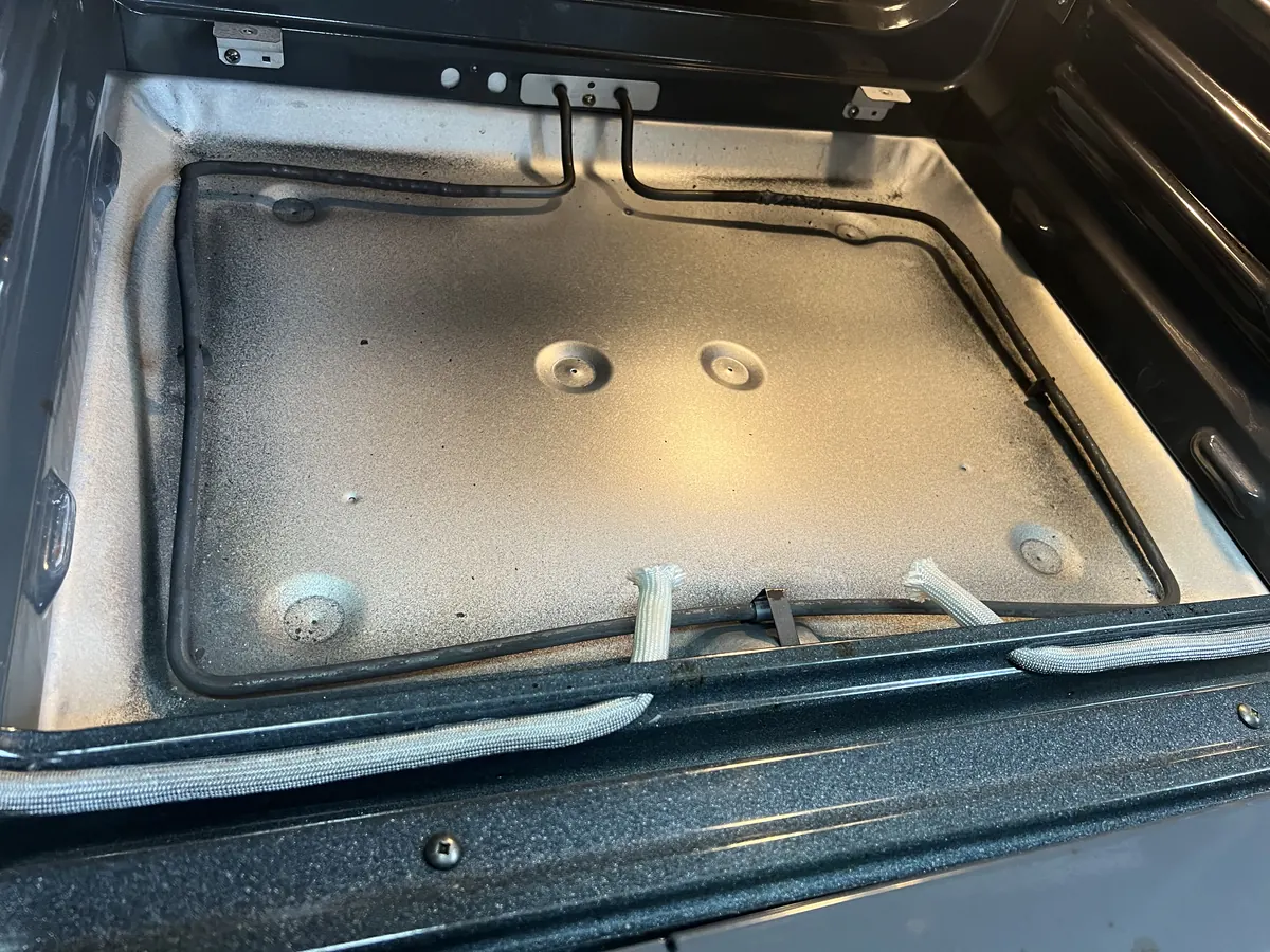 Oven cavity bake element repair in progress