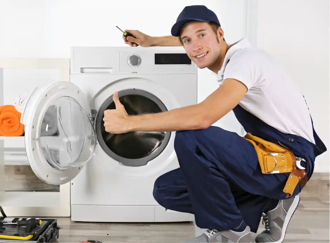Swift Appliance Solution technician repairing a washing machine in Toronto